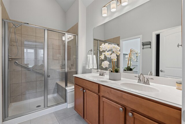 813 Louisville Rd, Aubrey, TX 76227 - bathroom featuring double vanity, tile patterned floors, and a shower stall