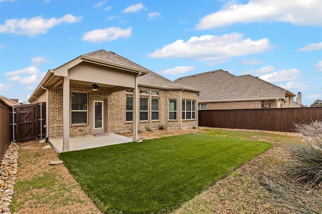 813 Louisville Rd, Aubrey, TX 76227 - rear view of house featuring a ceiling fan, a patio, brick siding, and a gate