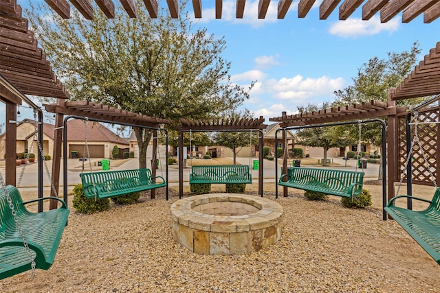 813 Louisville Rd, Aubrey, TX 76227 - view of patio with a pergola and an outdoor fire pit