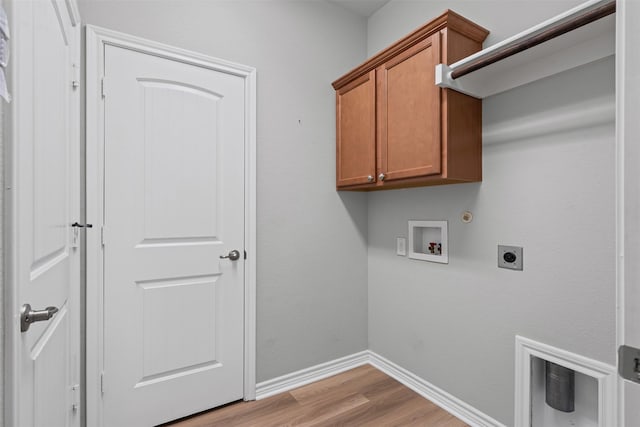 813 Louisville Rd, Aubrey, TX 76227 - washroom featuring washer hookup, electric dryer hookup, light wood finished floors, baseboards, and cabinet space