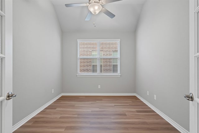 813 Louisville Rd, Aubrey, TX 76227 - spare room featuring lofted ceiling, light wood finished floors, a ceiling fan, and baseboards