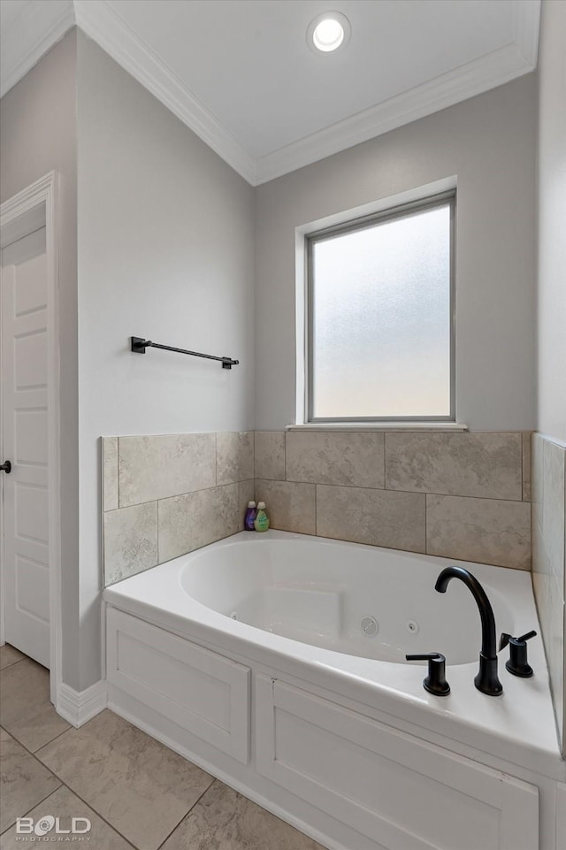 full bath featuring a tub with jets and crown molding