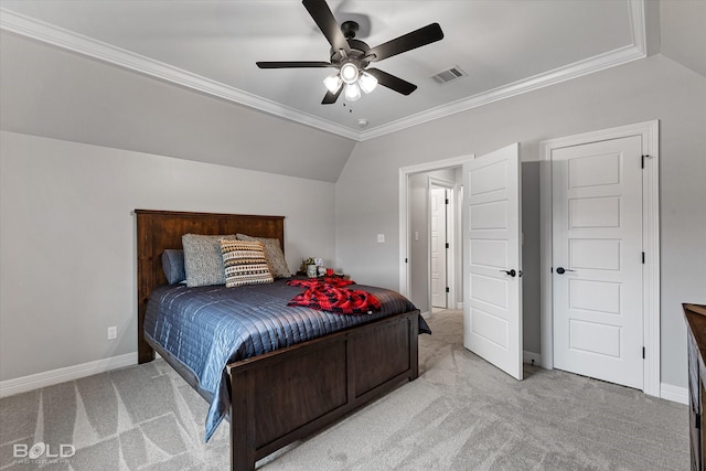 bedroom featuring light colored carpet, visible vents, baseboards, vaulted ceiling, and crown molding