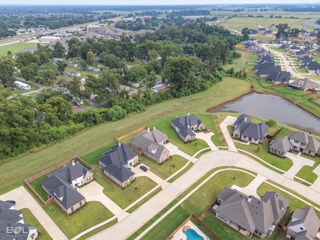 aerial view with a residential view and a water view