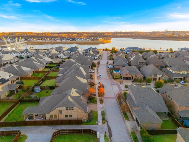 aerial view with a residential view and a water view