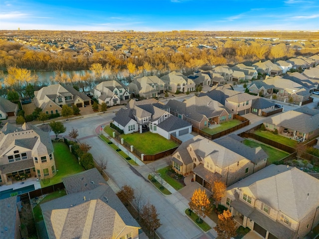 aerial view featuring a water view and a residential view