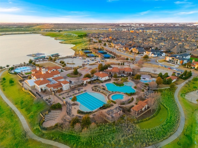 aerial view featuring a water view and a residential view