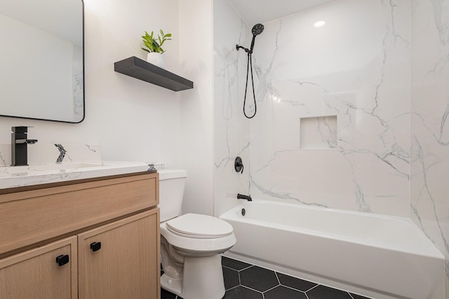 full bath featuring toilet, tile patterned floors, washtub / shower combination, and vanity