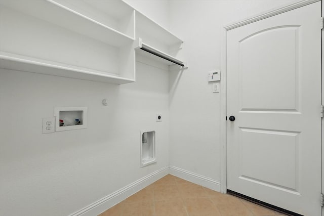 869 Field Xing, Little Elm, TX 76227 - washroom with hookup for a gas dryer, baseboards, hookup for an electric dryer, washer hookup, and light tile patterned flooring