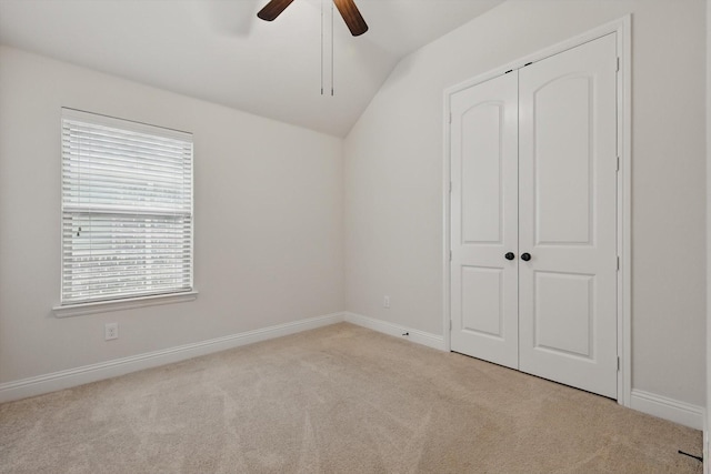 869 Field Xing, Little Elm, TX 76227 - unfurnished bedroom featuring carpet, lofted ceiling, baseboards, and a closet