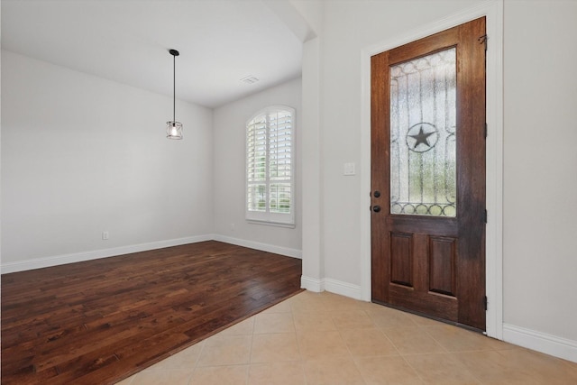 869 Field Xing, Little Elm, TX 76227 - entrance foyer featuring baseboards and wood finished floors