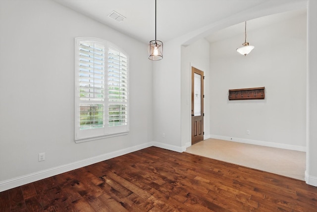 869 Field Xing, Little Elm, TX 76227 - empty room with healthy amount of natural light, dark wood finished floors, and baseboards