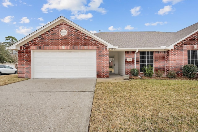 single story home featuring brick siding, a shingled roof, concrete driveway, an attached garage, and a front yard