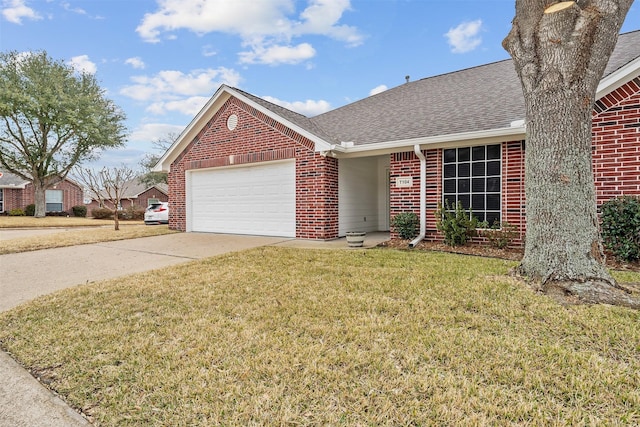 single story home featuring a garage, a front lawn, concrete driveway, and brick siding