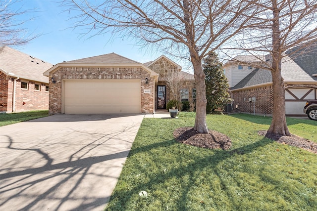 view of front facade featuring a garage, brick siding, driveway, roof with shingles, and a front yard