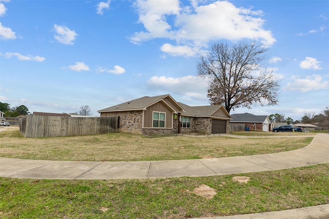 single story home featuring a garage, brick siding, fence, board and batten siding, and a front yard