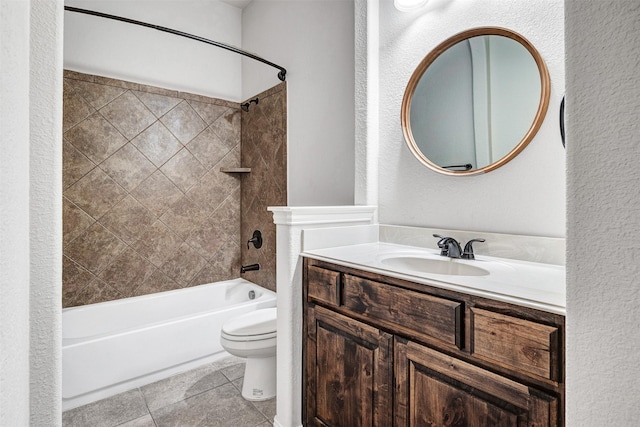 bathroom featuring toilet, shower / washtub combination, tile patterned flooring, and vanity