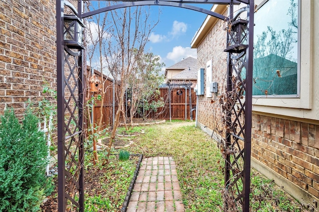 view of yard with a fenced backyard