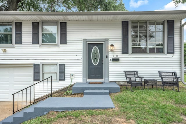 property entrance featuring a garage