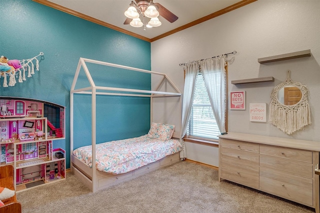 bedroom with light carpet, baseboards, a textured wall, ceiling fan, and crown molding