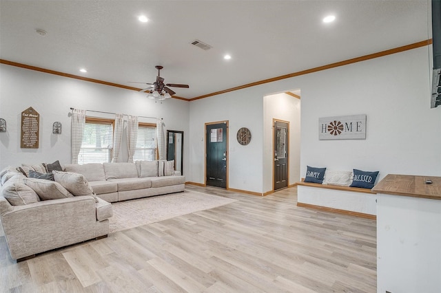 living area with recessed lighting, a ceiling fan, visible vents, baseboards, and light wood finished floors