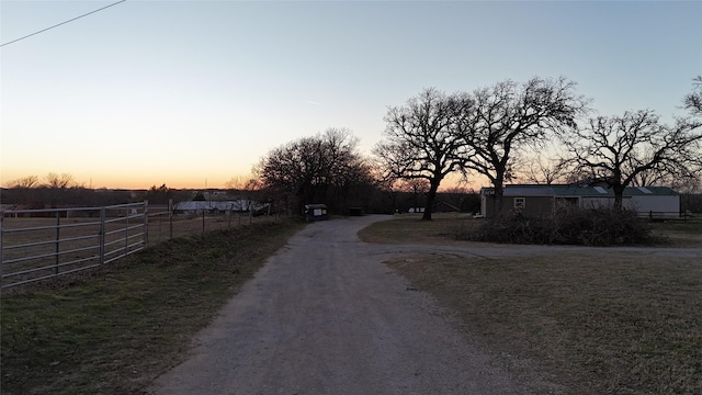 view of road with driveway