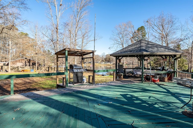 exterior space with a gazebo and a water view