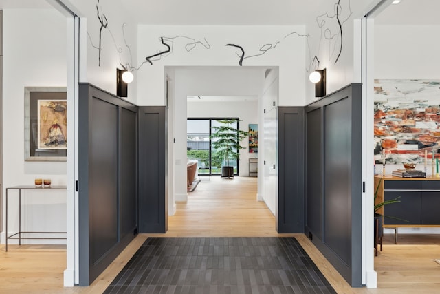 hallway featuring light wood finished floors