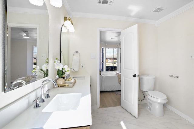 full bath with ornamental molding, connected bathroom, and a sink