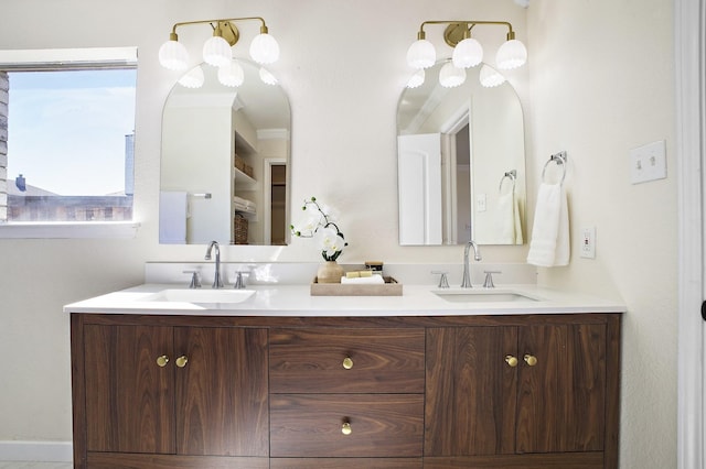 bathroom with double vanity and a sink