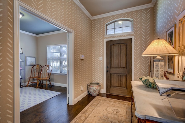 entrance foyer with baseboards, dark wood-style flooring, crown molding, and wallpapered walls