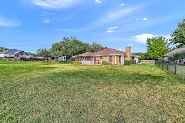 view of yard featuring fence