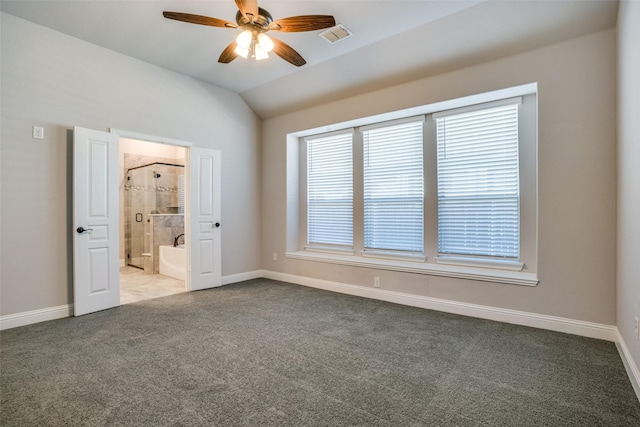 spare room with lofted ceiling, visible vents, a ceiling fan, light carpet, and baseboards