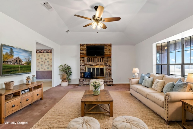 735 State Highway 37 N, Clarksville, TX 75426 - living area featuring visible vents, a ceiling fan, a fireplace, and carpet flooring
