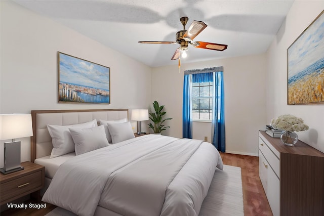 735 State Highway 37 N, Clarksville, TX 75426 - bedroom featuring ceiling fan and baseboards