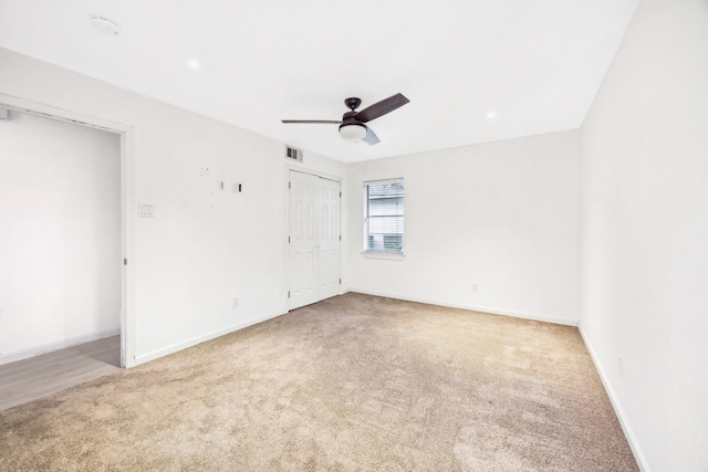 7743 Claremont Dr, Dallas, TX 75228 - unfurnished bedroom with carpet floors, baseboards, and ceiling fan