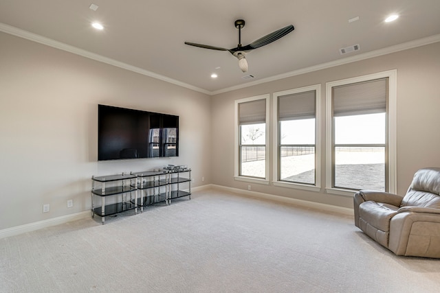 living area featuring baseboards, light colored carpet, visible vents, and crown molding