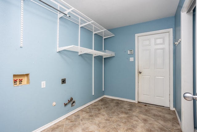 laundry area with hookup for a washing machine, laundry area, hookup for an electric dryer, and baseboards