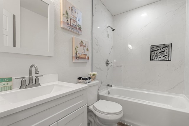 full bathroom with shower / bathing tub combination, vanity, and toilet