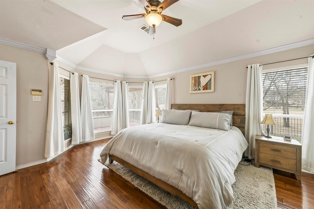 bedroom featuring lofted ceiling, dark wood-style flooring, visible vents, baseboards, and ornamental molding