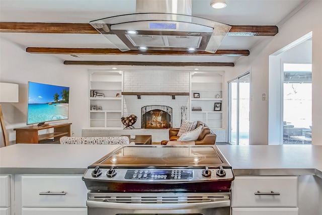 kitchen with built in features, stainless steel electric stove, light countertops, and beamed ceiling