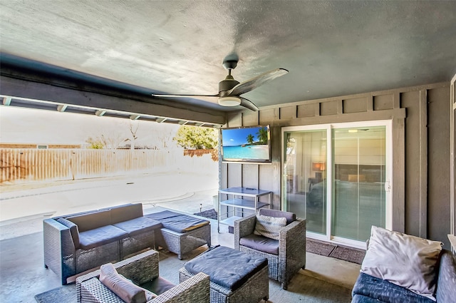 view of patio / terrace with fence, an outdoor hangout area, and ceiling fan