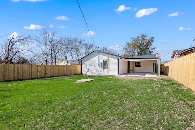 3721 Stuart Dr, Fort Worth, TX 76110 - rear view of house featuring a yard, a patio, and a fenced backyard