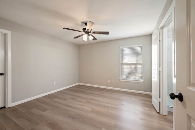 3721 Stuart Dr, Fort Worth, TX 76110 - unfurnished bedroom with ceiling fan, light wood-style flooring, and baseboards