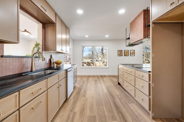 4707 Weyhill Dr, Arlington, TX 76013 - kitchen with a sink, stainless steel dishwasher, light wood finished floors, decorative backsplash, and dark countertops