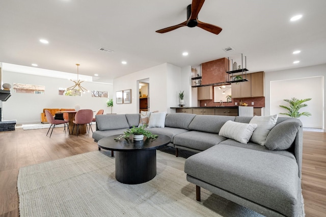 4707 Weyhill Dr, Arlington, TX 76013 - living room with recessed lighting, light wood-style floors, a ceiling fan, and baseboards