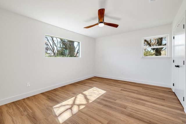 4707 Weyhill Dr, Arlington, TX 76013 - spare room with baseboards, ceiling fan, and light wood-style flooring