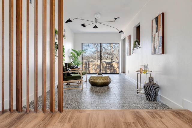 4707 Weyhill Dr, Arlington, TX 76013 - hallway featuring baseboards and wood finished floors