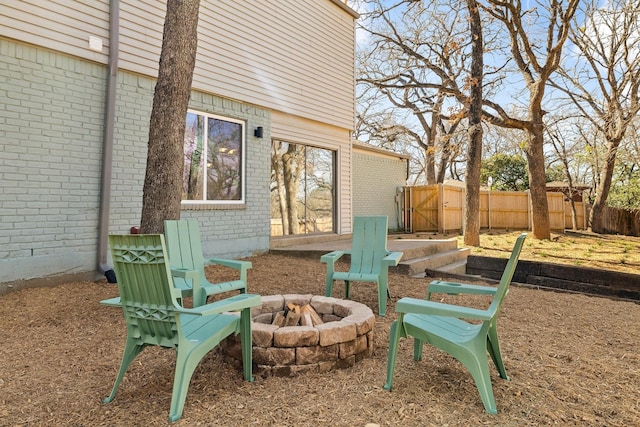 4707 Weyhill Dr, Arlington, TX 76013 - view of patio with a fire pit, fence, and a gate