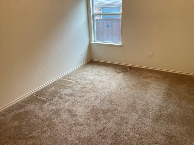 view of carpeted spare room